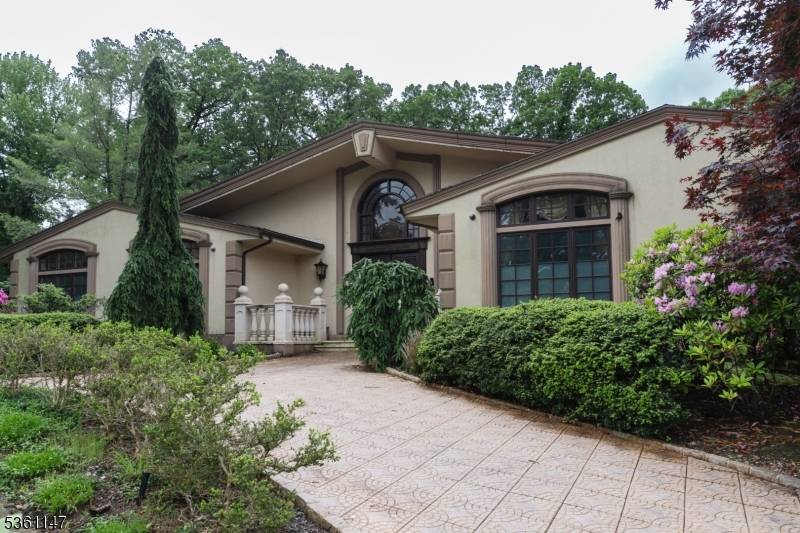 This stunning 5 bedroom, 5.
