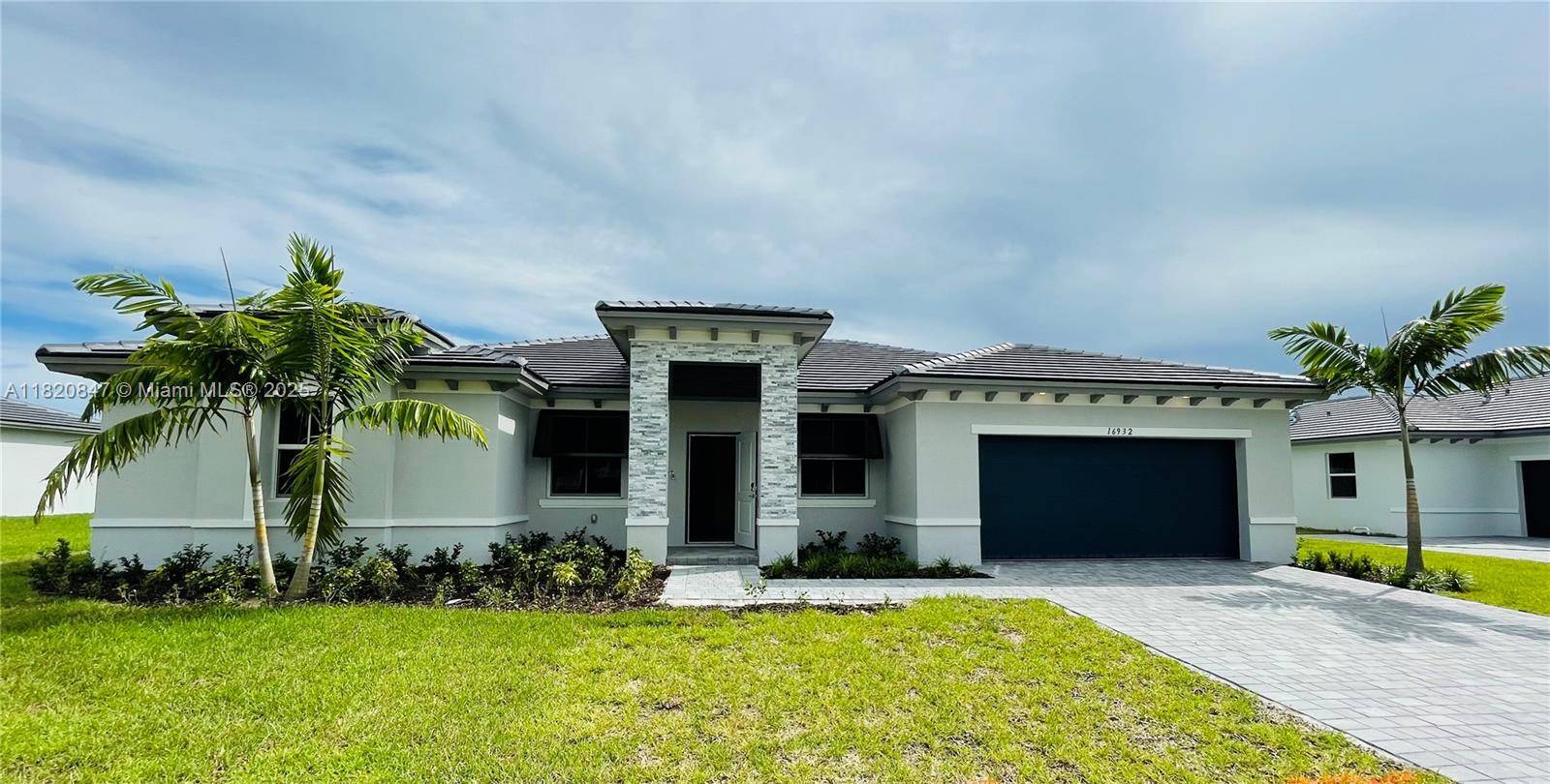 This stunning 4 bedroom, 3 bath home offers a spacious open floor plan, a modern kitchen with stainless steel appliances, and a large backyard perfect for entertaining.