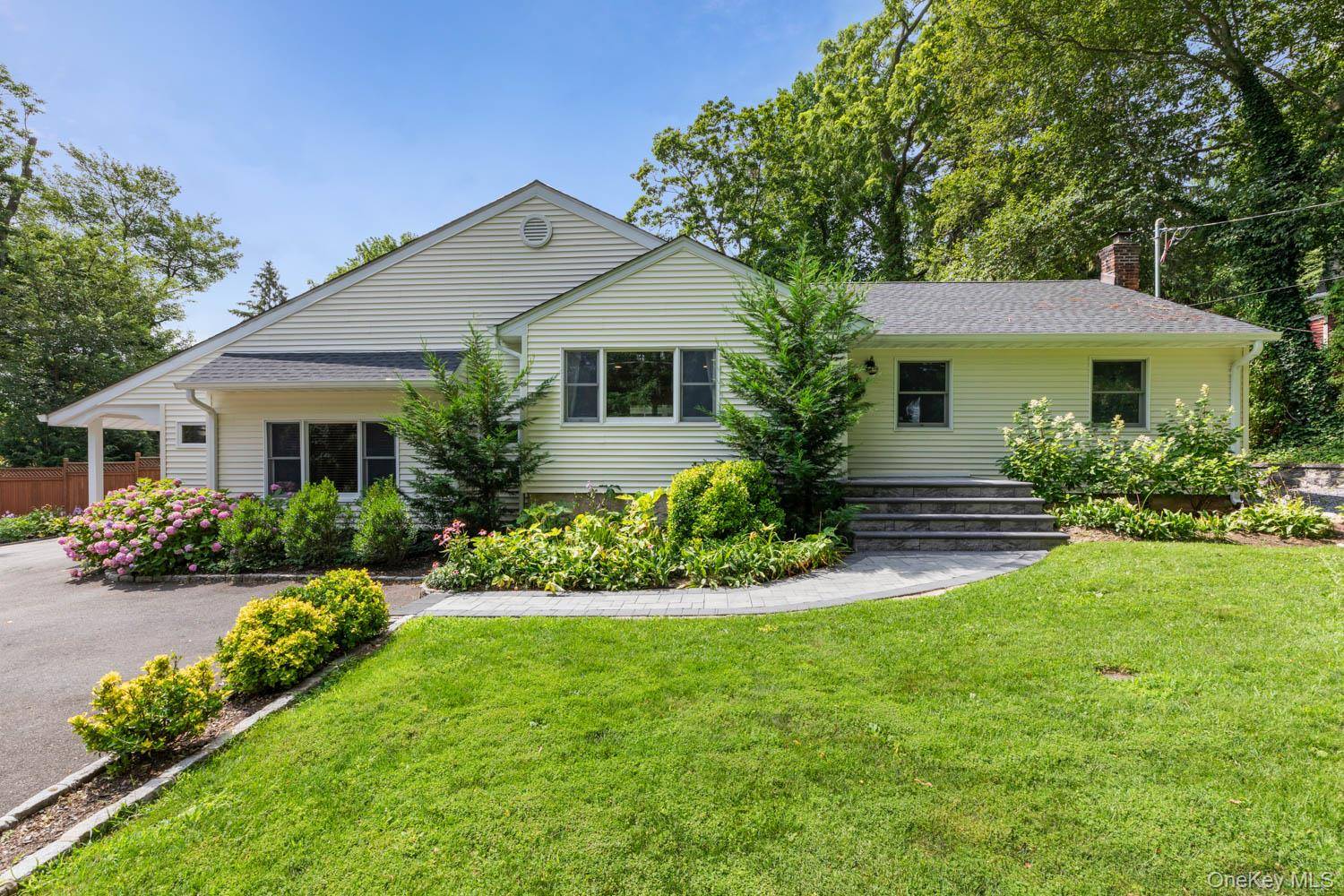 Welcome to 66 Chichester Road, a charming expanded ranch nestled in the highly desirable West Hills neighborhood.
