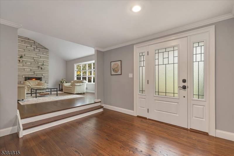 Exuding sophistication in the coveted Murray Hill section of Berkeley Heights, this beautifully renovated 4 bedroom, 3 full bath home seamlessly blends modern elegance with timeless charm.