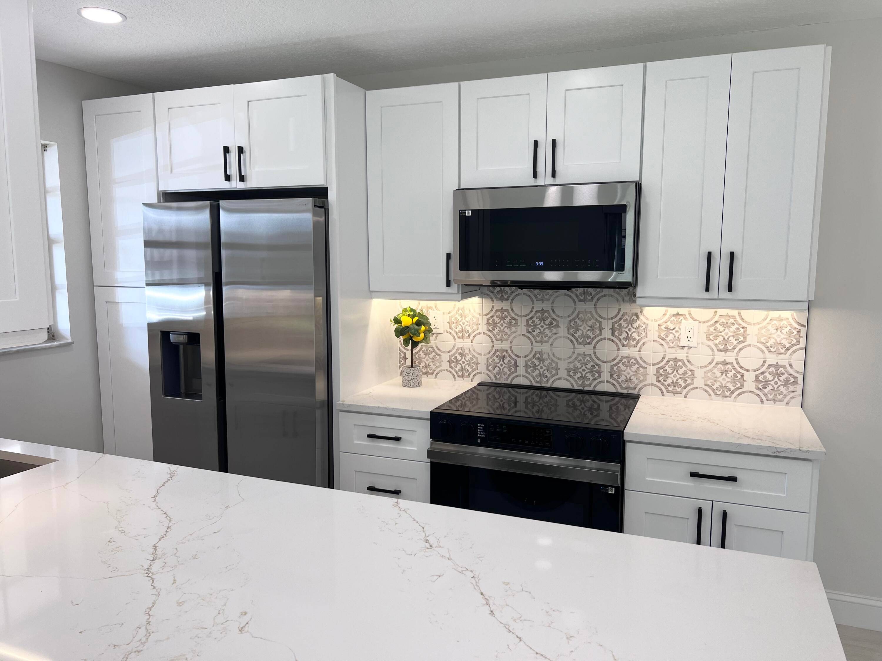 Stunningly updated 2 2 villa with den office in prime Delray Beach location !