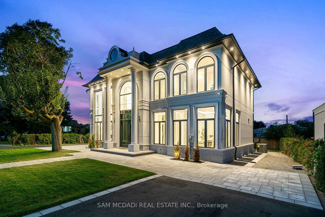 Welcome to 321 Morden Rd, a brand new French Chateau inspired estate that seamlessly blends timeless elegance with modern luxury.