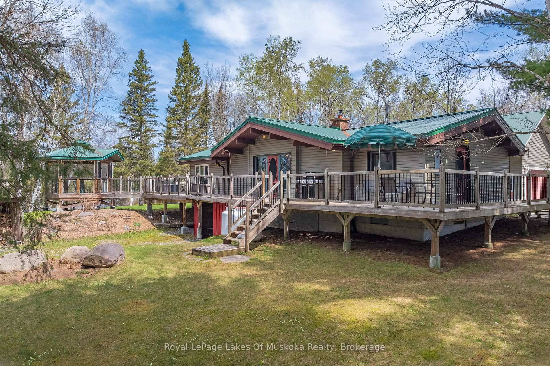 Welcome to this exclusive year round Panabode style timber home or cottage on the most desirable chain of lakes in the area with over 40 miles of boating pleasure.