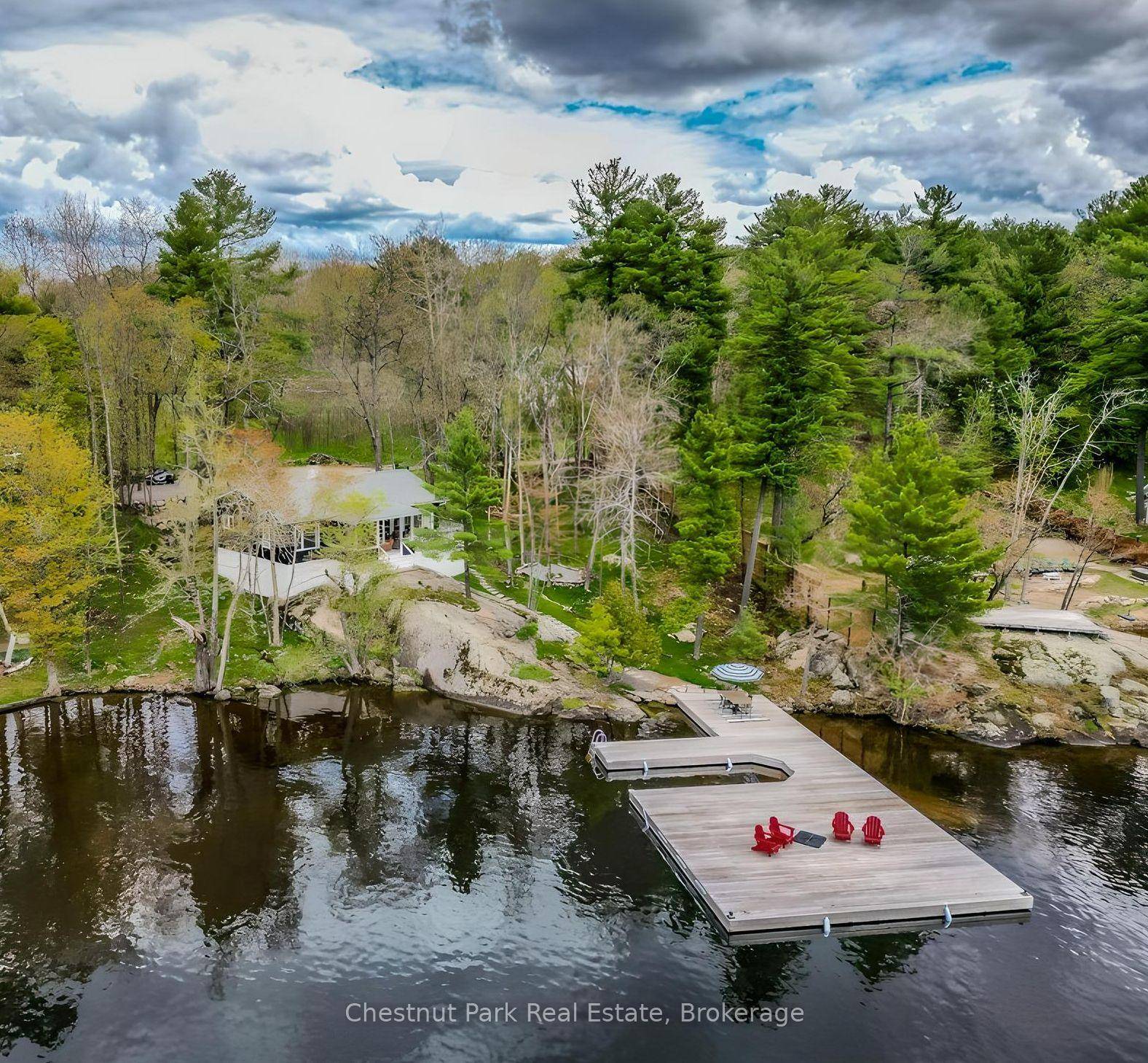 Discover the pinnacle of lakefront living with this beautifully renovated 3 bedroom, 2 bathroom year round cottage located on the prestigious Golden Shore of Lake Muskoka.