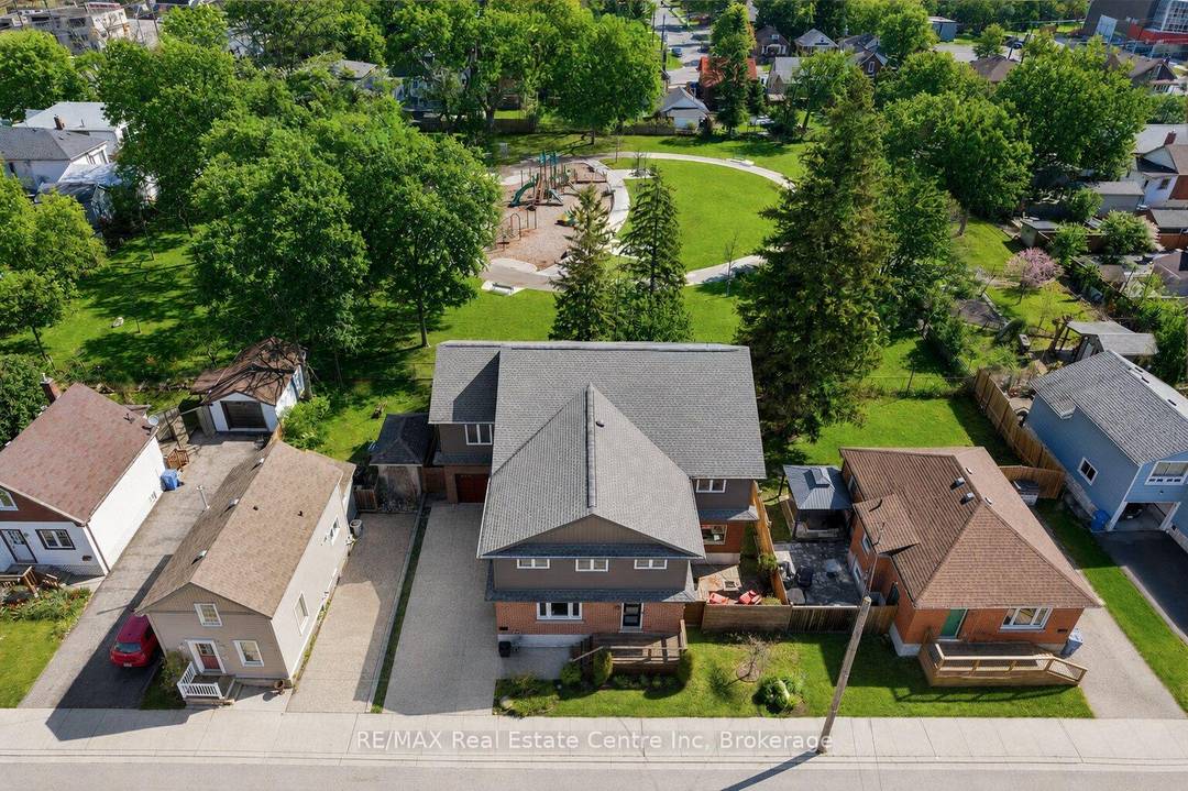 Custom 5 1 bdrm, 5. 1 bath home W 2 bdrm in law suite backing onto tree lined park in one of the city's most convenient locations !