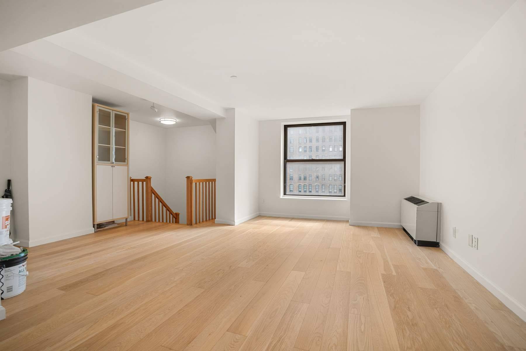 Rarely available and highly sought after, Residence 11L at the Downtown Club Condominium is a fully gut renovated duplex offering nearly 1, 850 square feet of bright, open loft living.