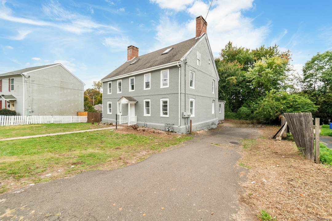 Rare Opportunity to acquire spacious income producing property with character, potential prime location 3, 336 Sq Ft 2 Family situated on 0.