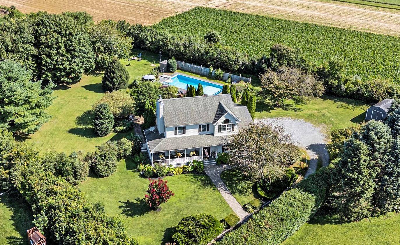 Tucked down a private, tree lined flag lot, this North Fork retreat reveals itself a beautifully renovated 3 bedroom, 2.