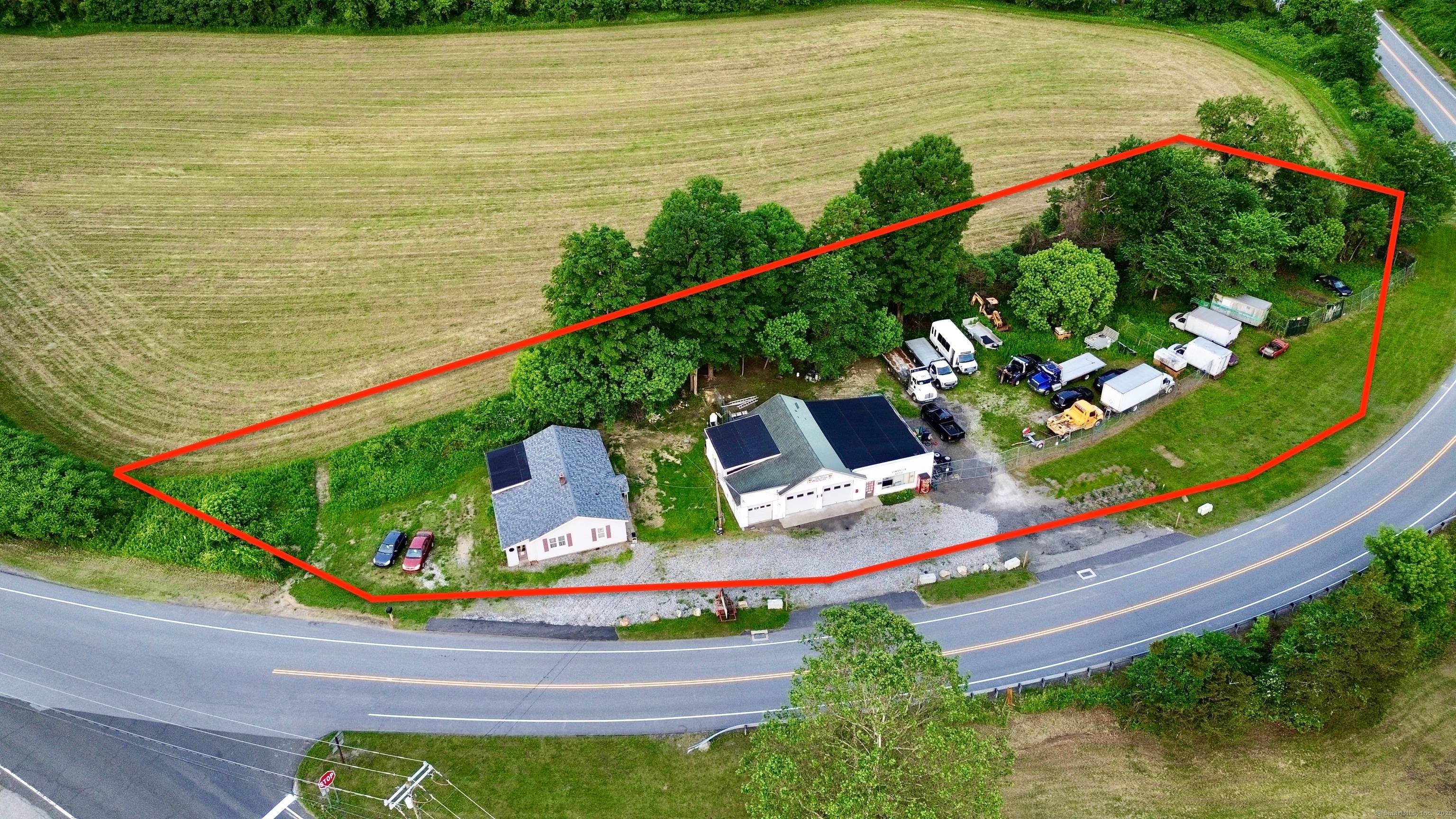 Versatile mixed use residential commercial property ideally situated on a high visibility stretch of Route 7.