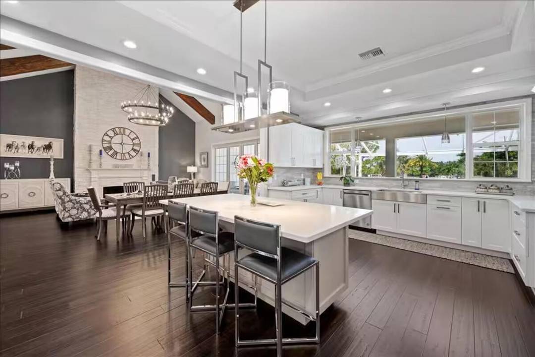 Experience elegance and luxury in this 5 bedroom family home in Wellington's prestigious Paddock Park II.