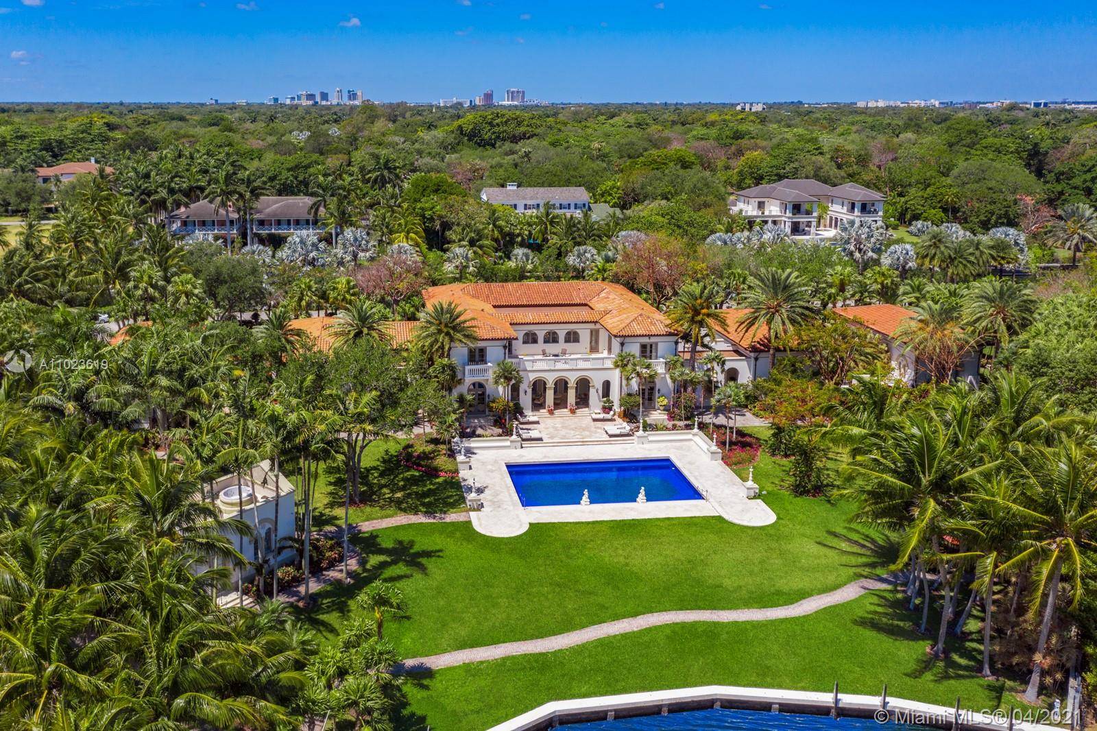 Inspired by the palatial Vanderbilt cottage at Newport, this magnificent Mediterranean Revival estate was designed by Rafael Portuondo, channels the visionary esthetic of City Beautiful founder George Merrick.