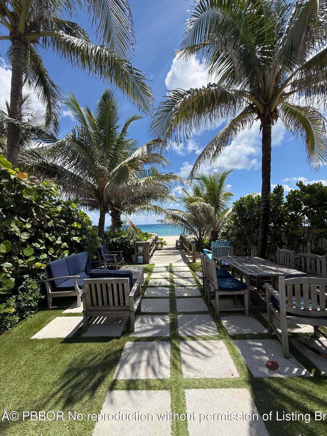 A beach lover's dream ! Rare opportunity to own just one house from the ocean on coveted Merrain Road.