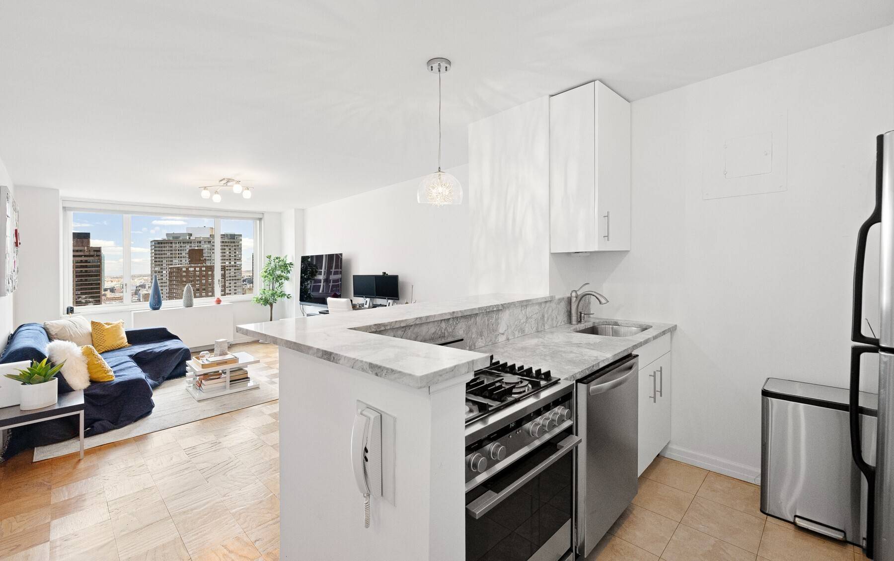 Welcome to the top floor of The Brevard, where peace and privacy await no neighbors above, just sky and sunlight streaming through oversized east facing windows with water views.