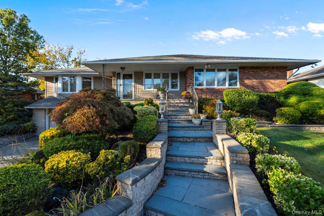 Welcome to a beautifully cared for home on one of the most inviting streets in Manhasset Hills, set on an expansive eighty five by one hundred foot property wrapped in ...