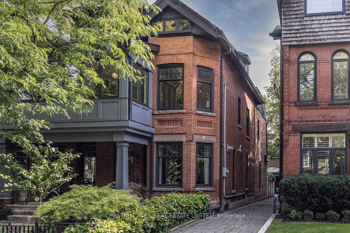 This beautifully executed back to the brick renovation blends timeless elegance with modern luxury in the heart of Summerhill.