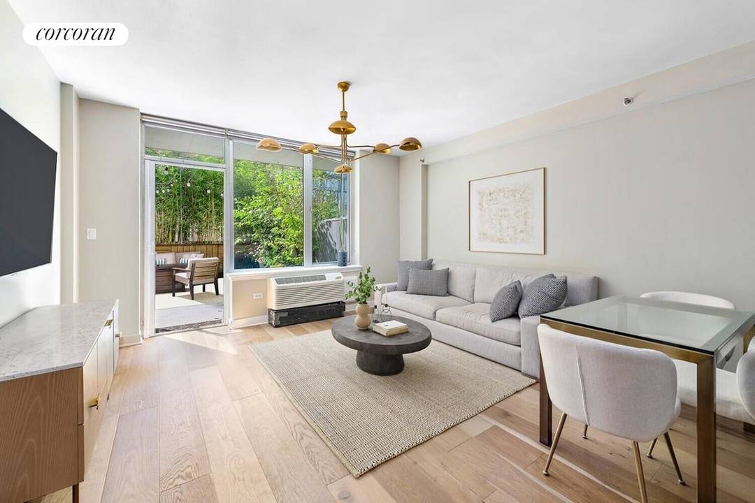 Welcome home to this rarely available, sun filled one bedroom condominium featuring a private 540 sq ft terrace, deeded parking, and private storage in prime South Williamsburg.