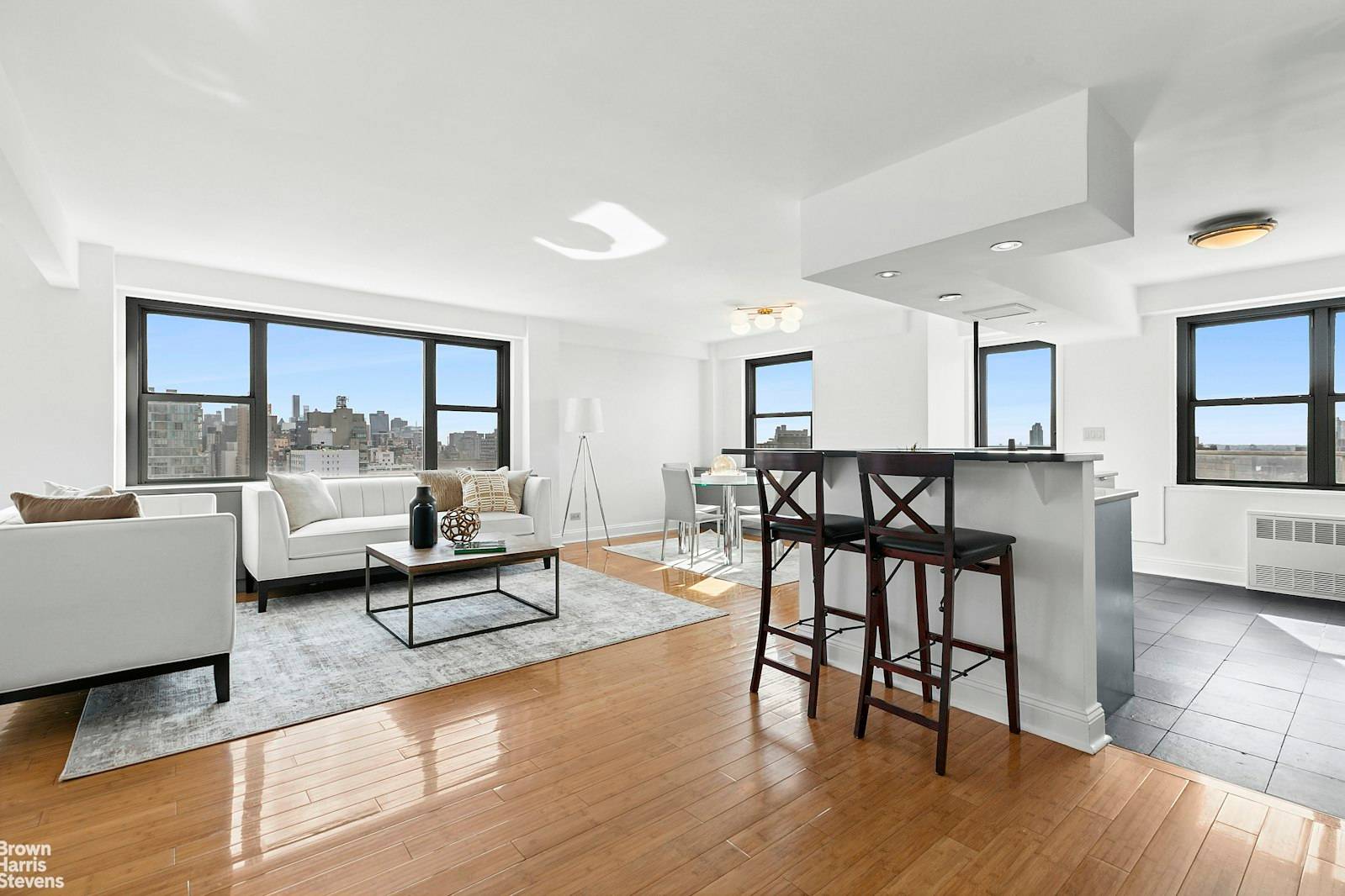 Light, Views, and Outdoor Space in the Heart of Downtown Soaring over the cityscape in a coveted corner line at the full service St.