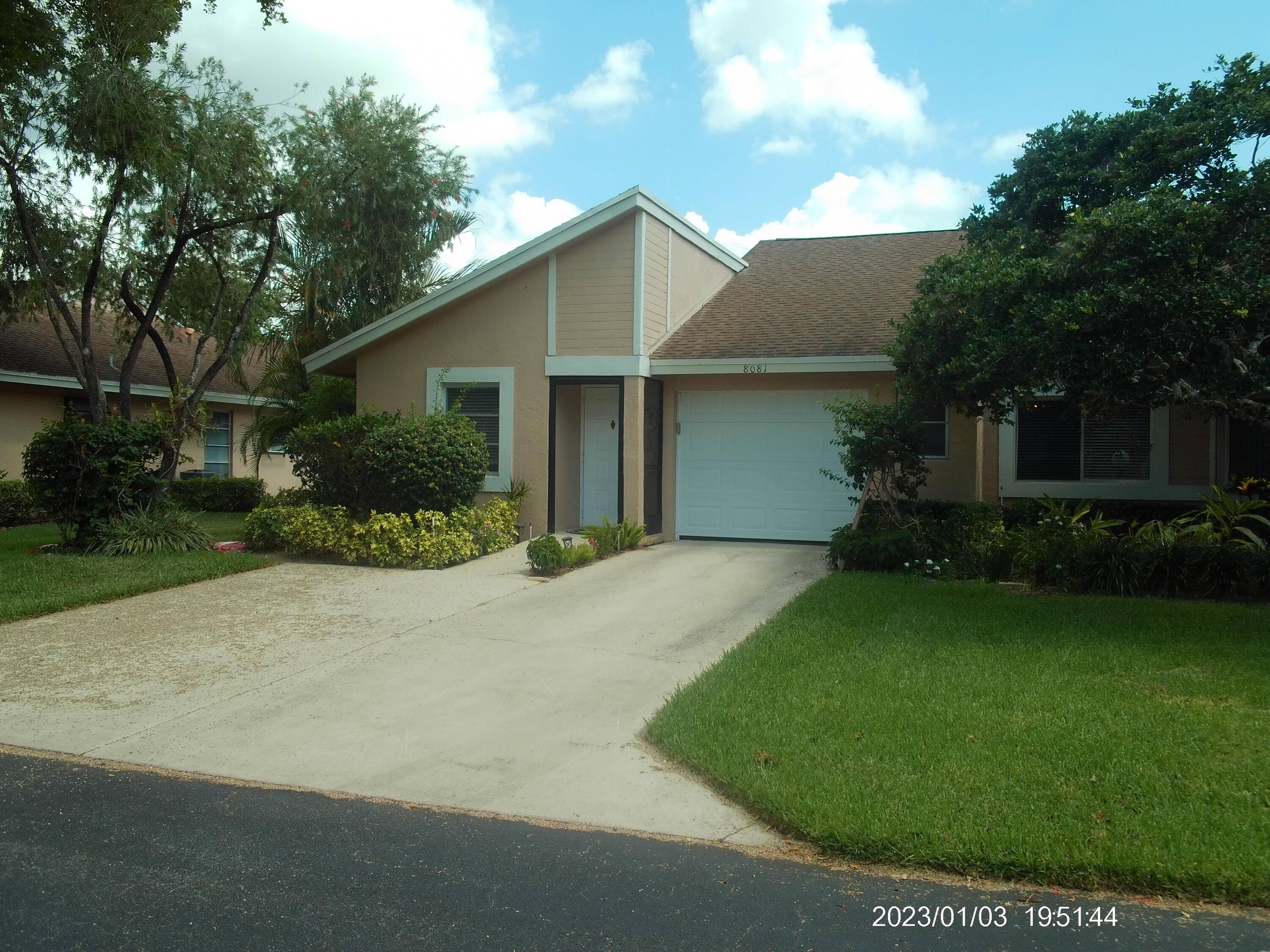 2 2 Corner Villa Champagne model with a 1 car garage.