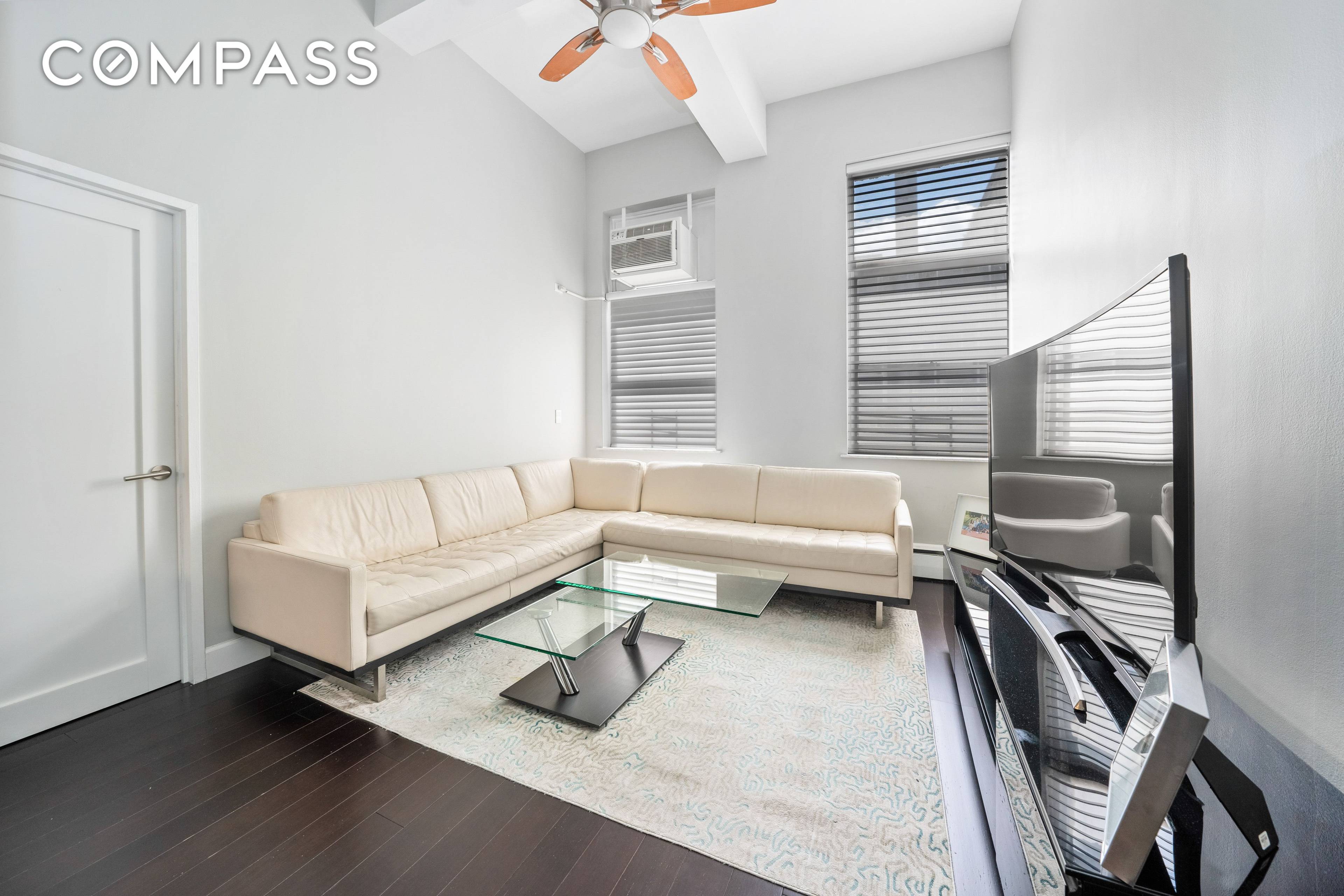 Exceptionally high ceilings make an impressive grand entrance into this fully renovated, modern 2 bedroom condo.