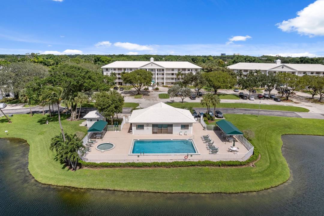 Stunning, private, renovated 2bed 2bath corner top 4th floor unit with pool and lakefront views.