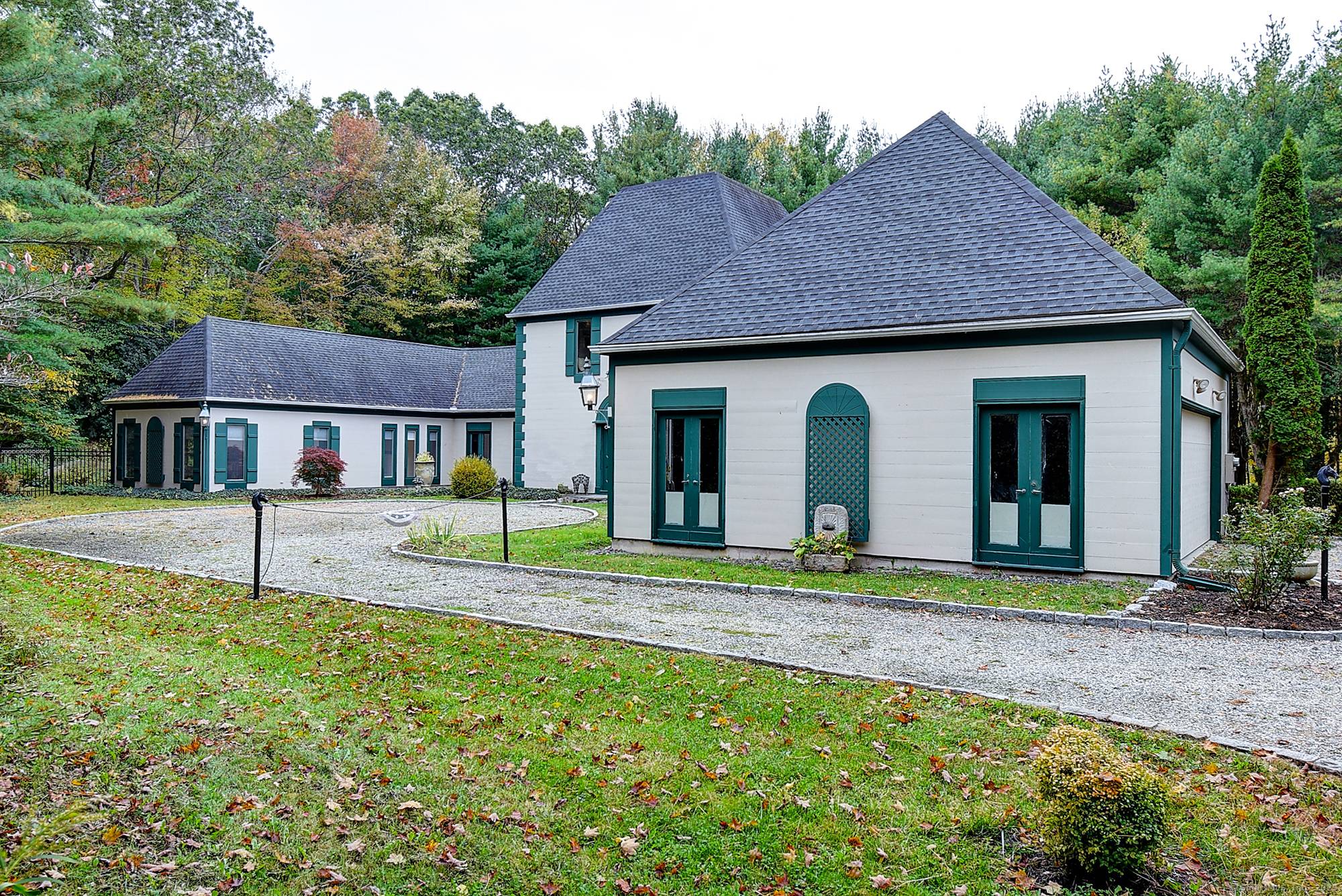 Welcome to 225 Crest Rd. This 4, 138 sq ft stately French Provincial Manor House sits on 3.