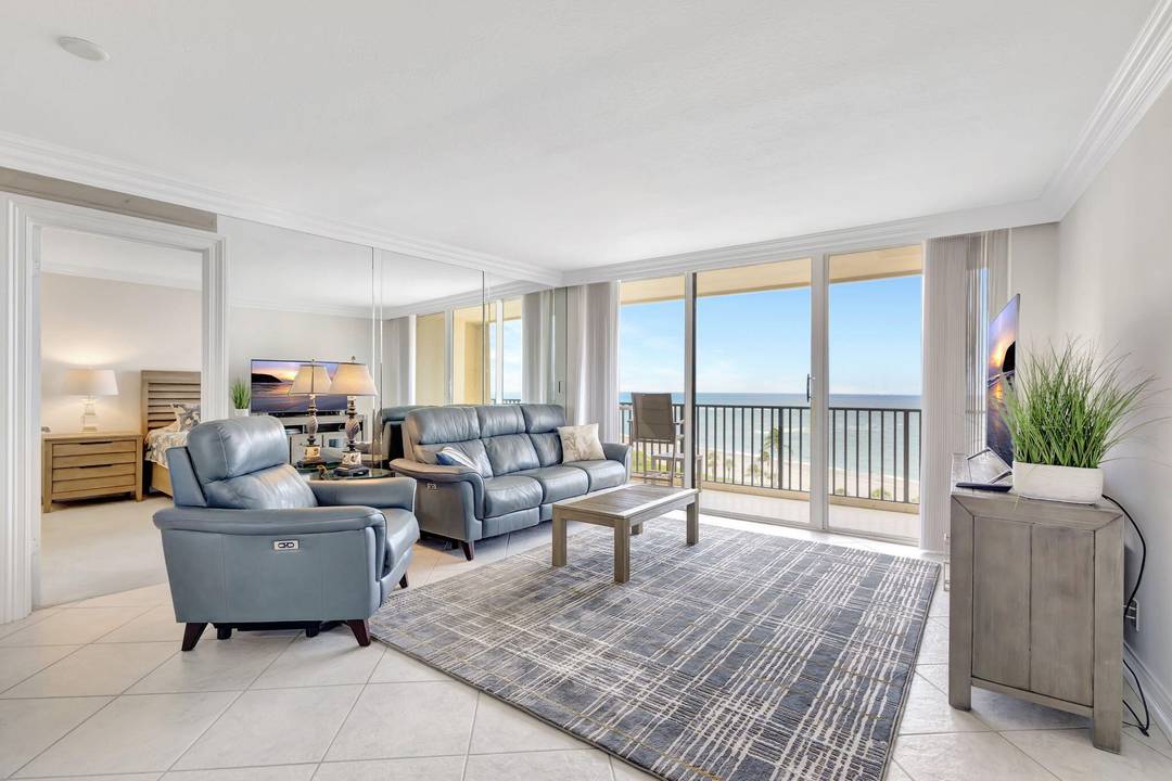 Enjoy sweeping direct ocean views from this beautifully updated two bedroom two bathroom residence in the highly desirable Ocean Trail community in Jupiter.