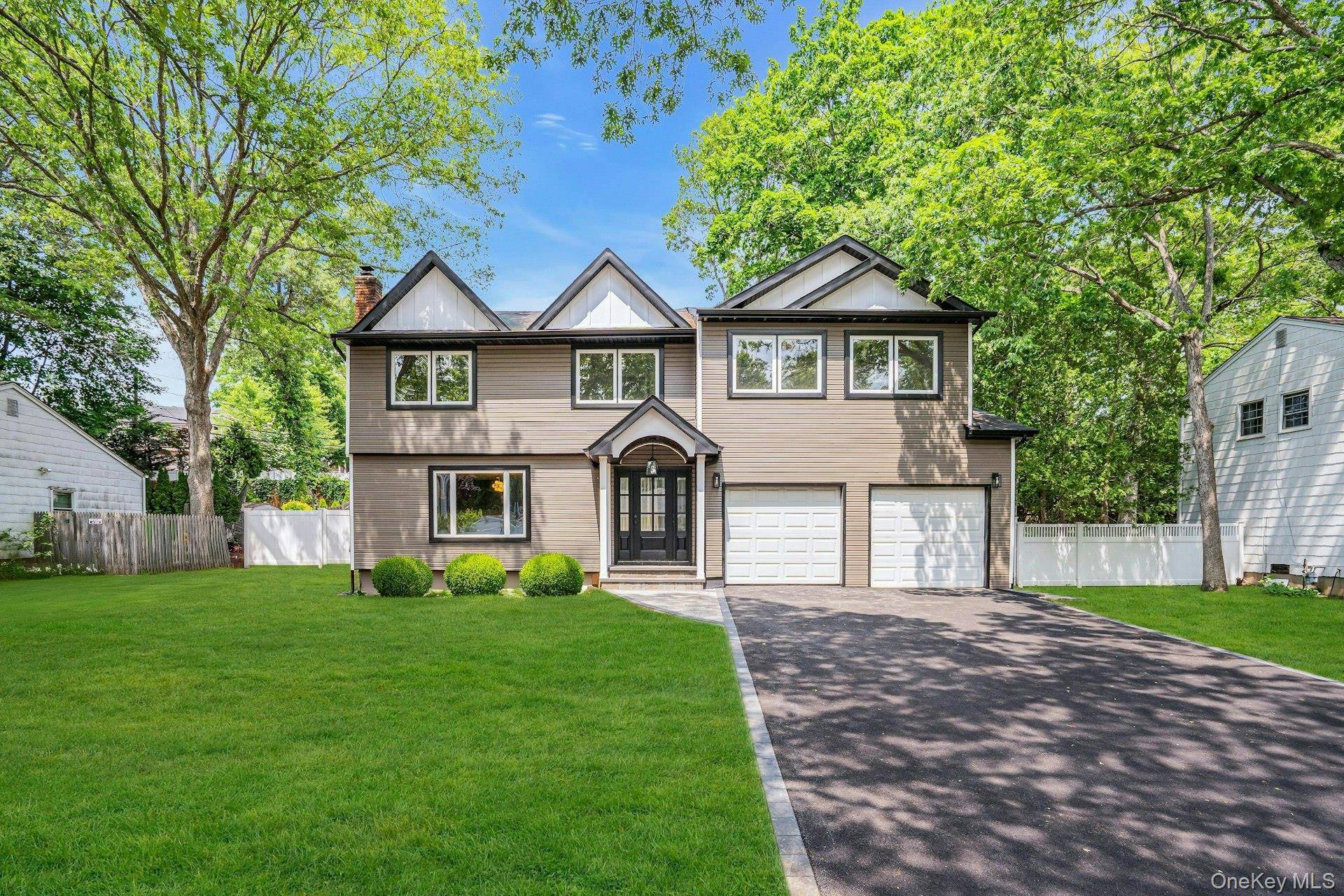 Welcome to 153 Cornell Drive, Commack where custom design meets modern luxury.