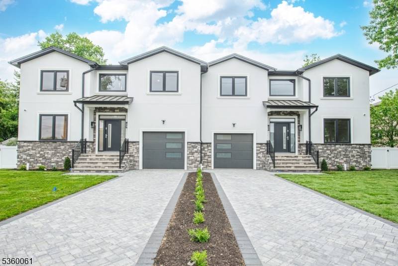 Welcome to this exquisite new construction duplex, offering 4 bedrooms and 2.