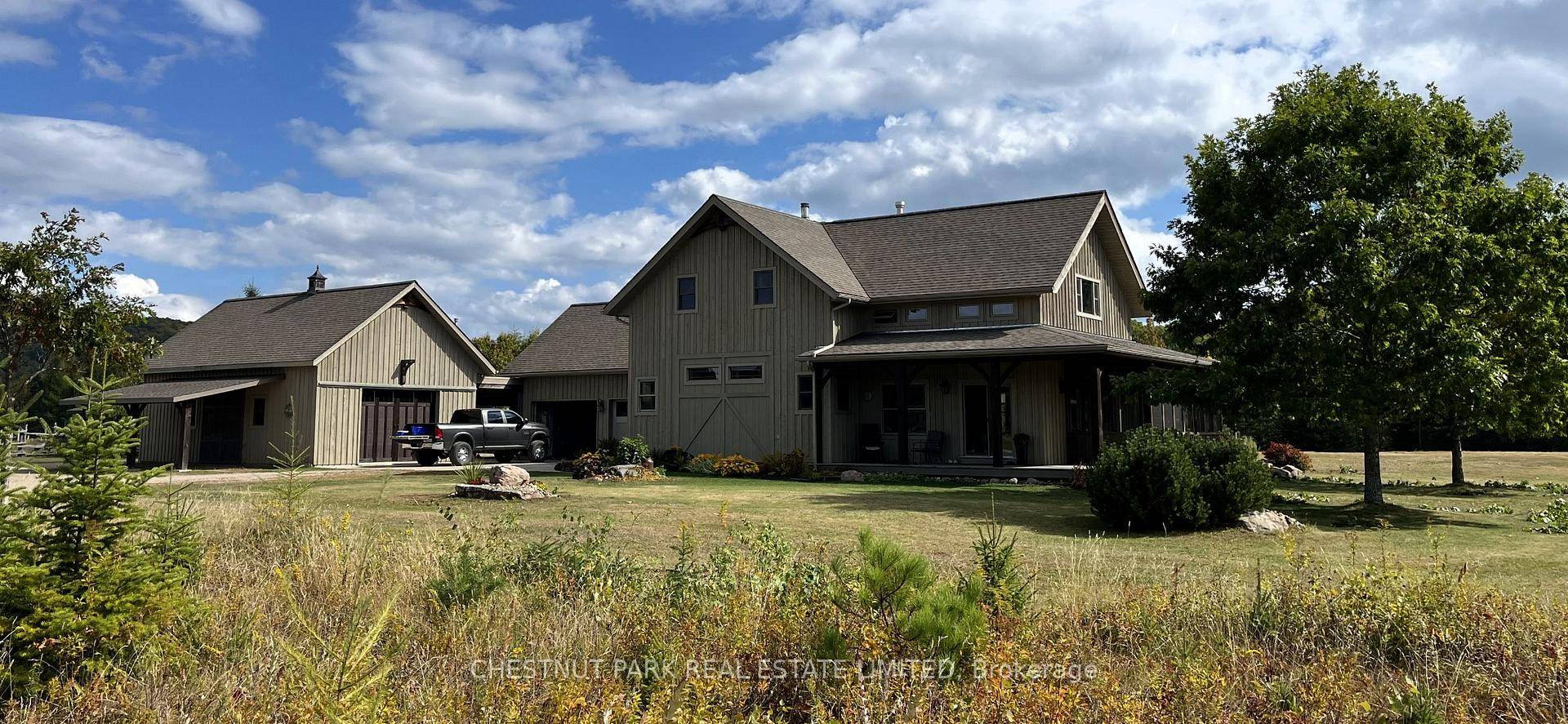 An extraordinary country estate set on 122 acres of rolling pasture, hardwood forest, and scenic trails.