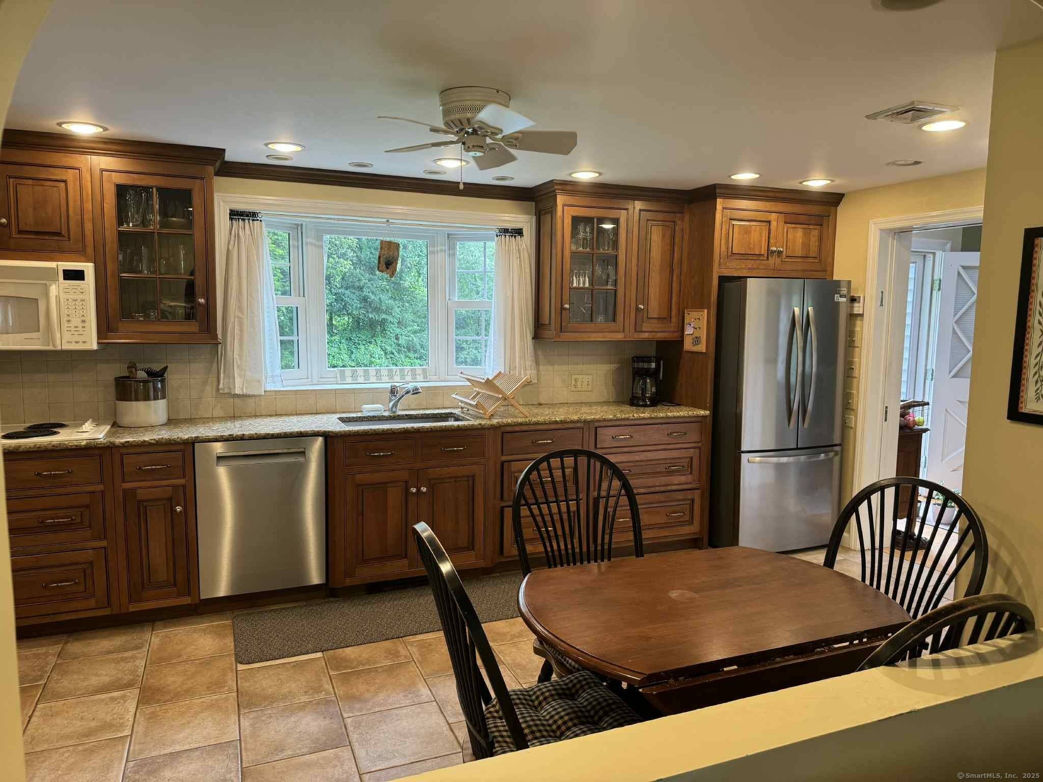4 bedroom Cape with huge fully fenced back yard.