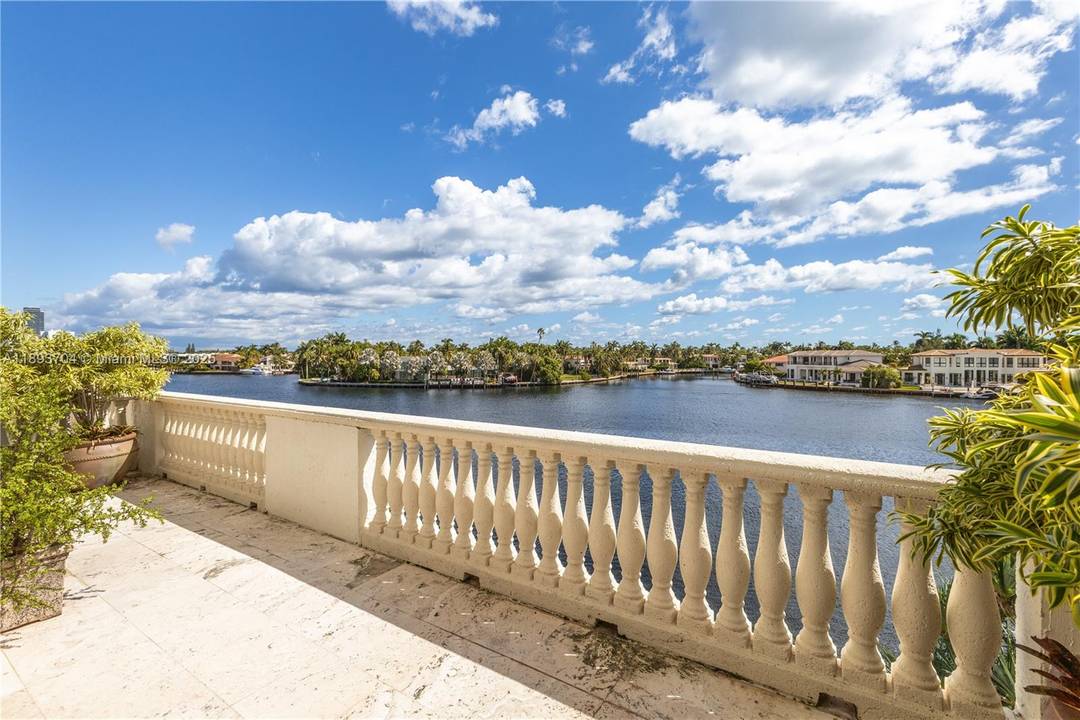 Rare Luxury Opportunity 200K Plus Assessment WILL BE PAID IN FULL by Seller Experience elevated waterfront living in the prestigious, guard gated enclave of Porto Vita.