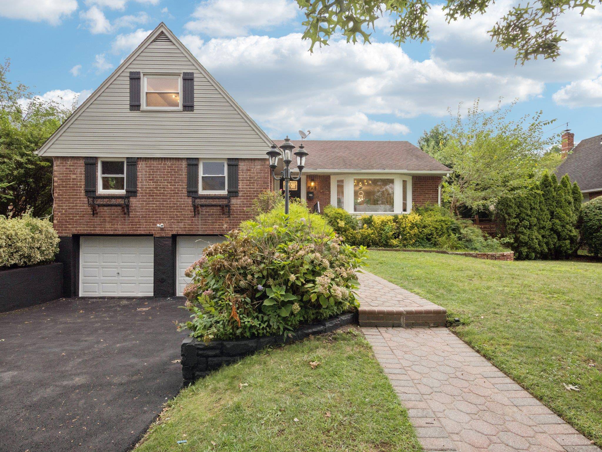 Welcome to 898 Baldwin Drive in highly sought after beautifully appointed Sherwood Gardens in Westbury.
