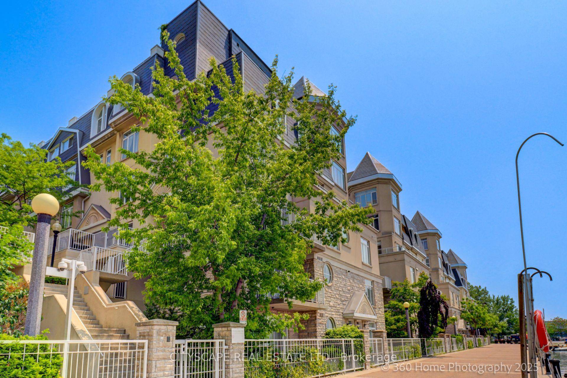 2 bedroom townhome w rare 2 large terraces and parking.