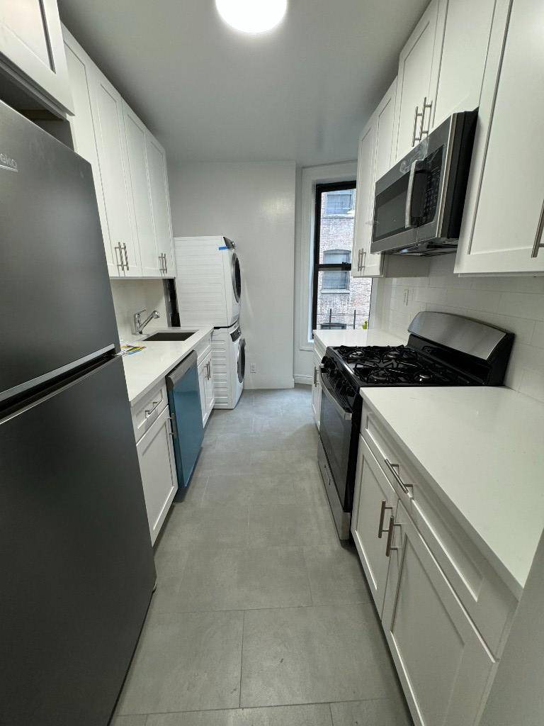 NEWLY RENOVATED, beautiful, sunny and spacious 3 bedroom apartment with IN UNIT WASHER AND DRYER and hardwood floors throughout.