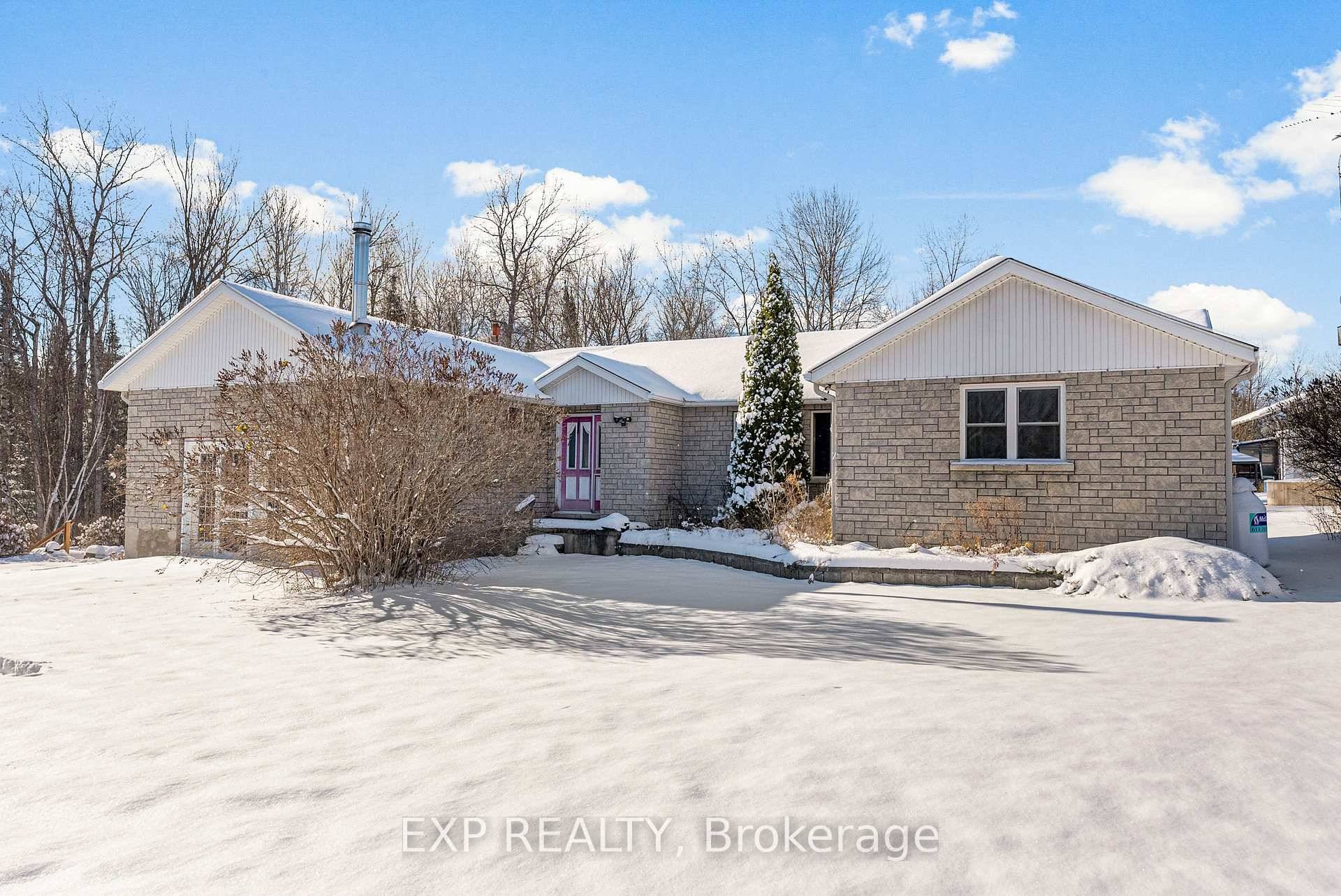 Welcome to 31343 Hwy 41 a solidly built 2 1 bedroom, 2 bath bungalow set on 8.