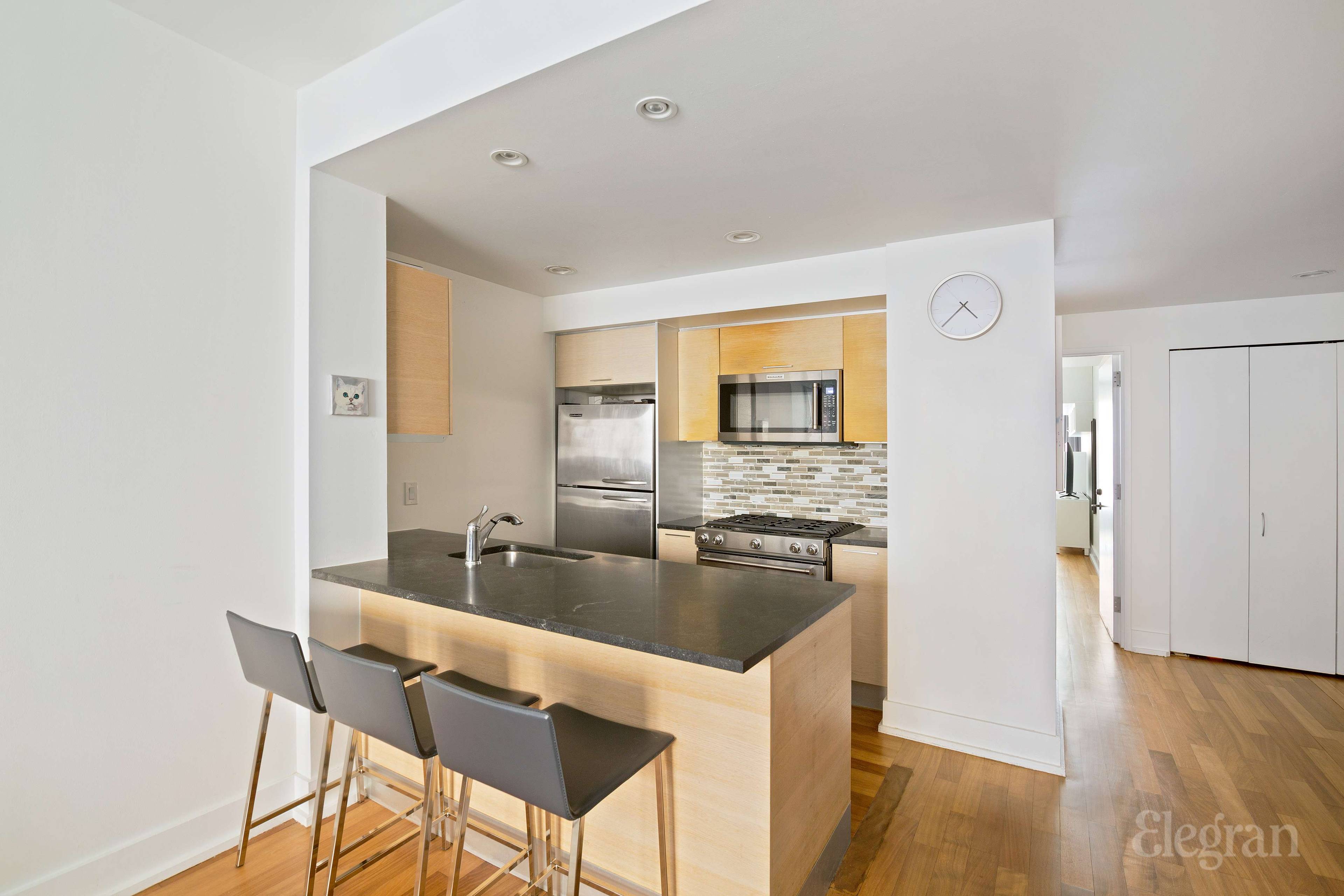 Upon stepping into 4E s spacious foyer, you immediately feel at home.