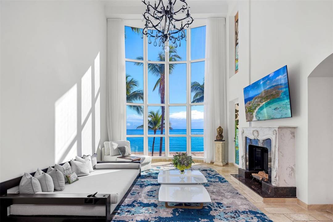 Enter your oceanfront townhome residence through a private gated entry and discover one of only seven exclusive 4, 800 sq.