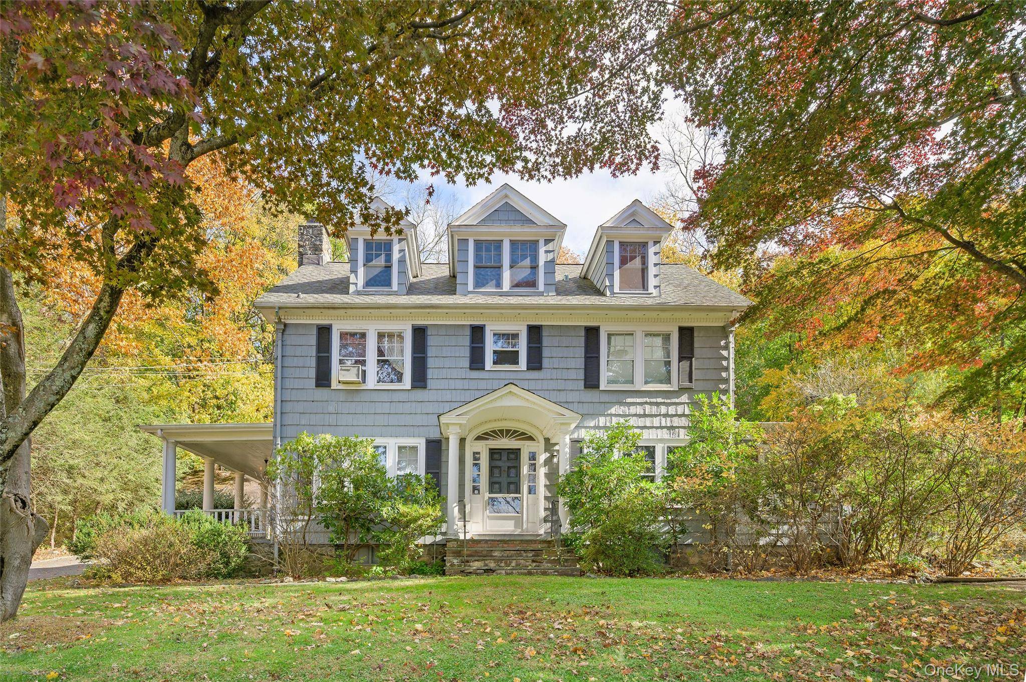 Timeless character meets endless possibility in this classic Katonah Colonial, set on a 1.