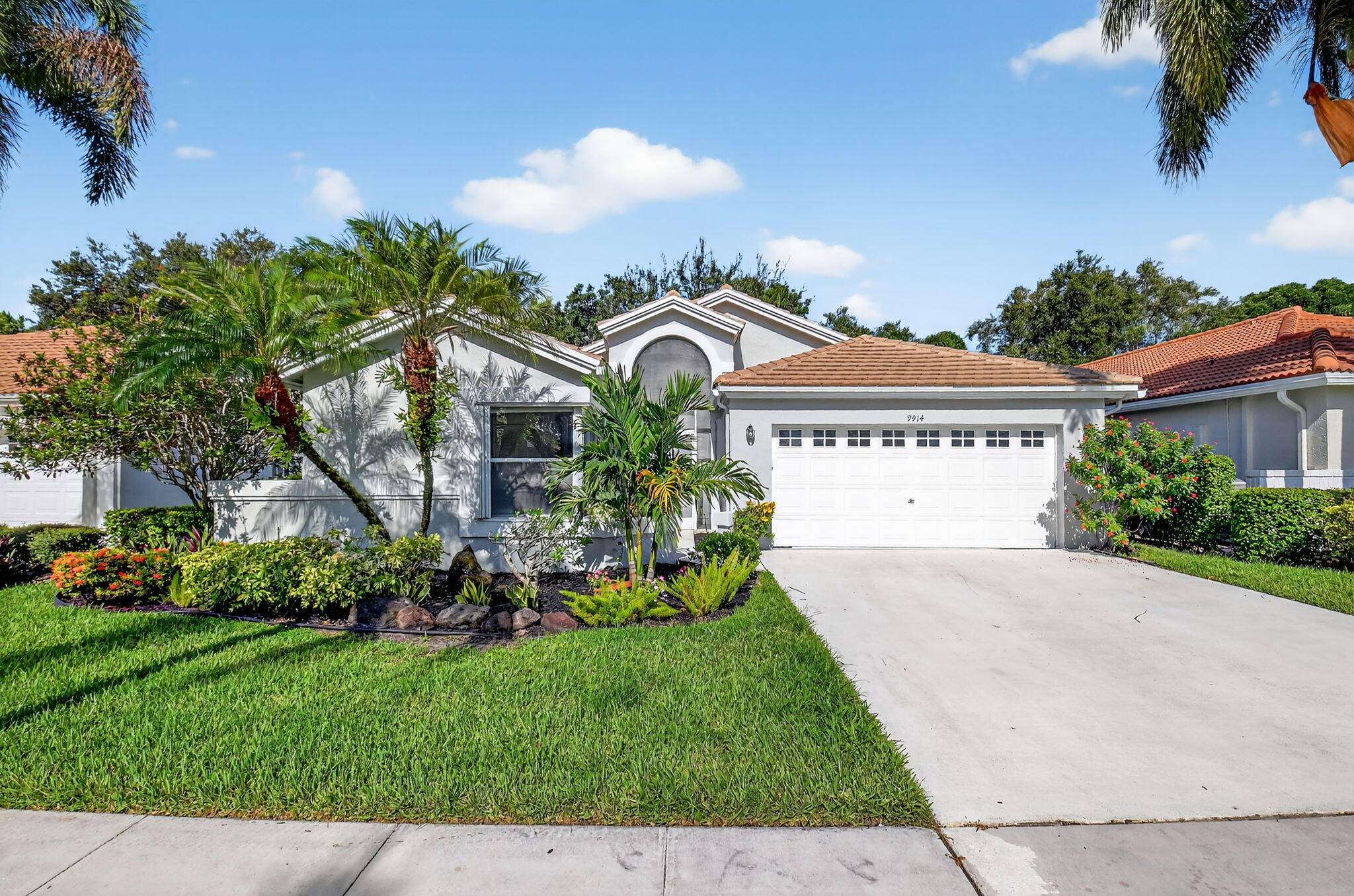 Welcome to a one of a kind home in the vibrant Palm Isles community !