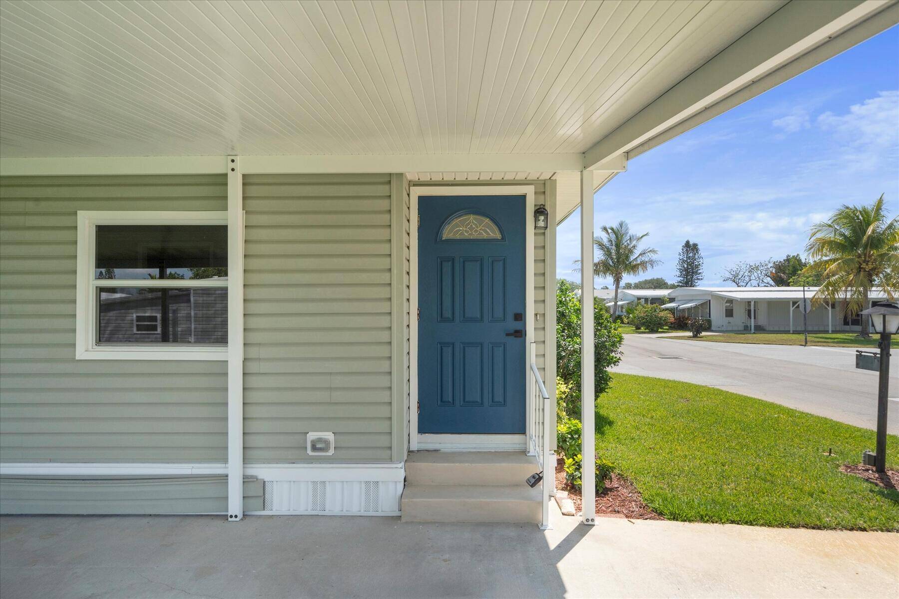 Welcome to your dream home in Pinelake Village, a 55 manufactured housing community in Jensen Beach, Florida.