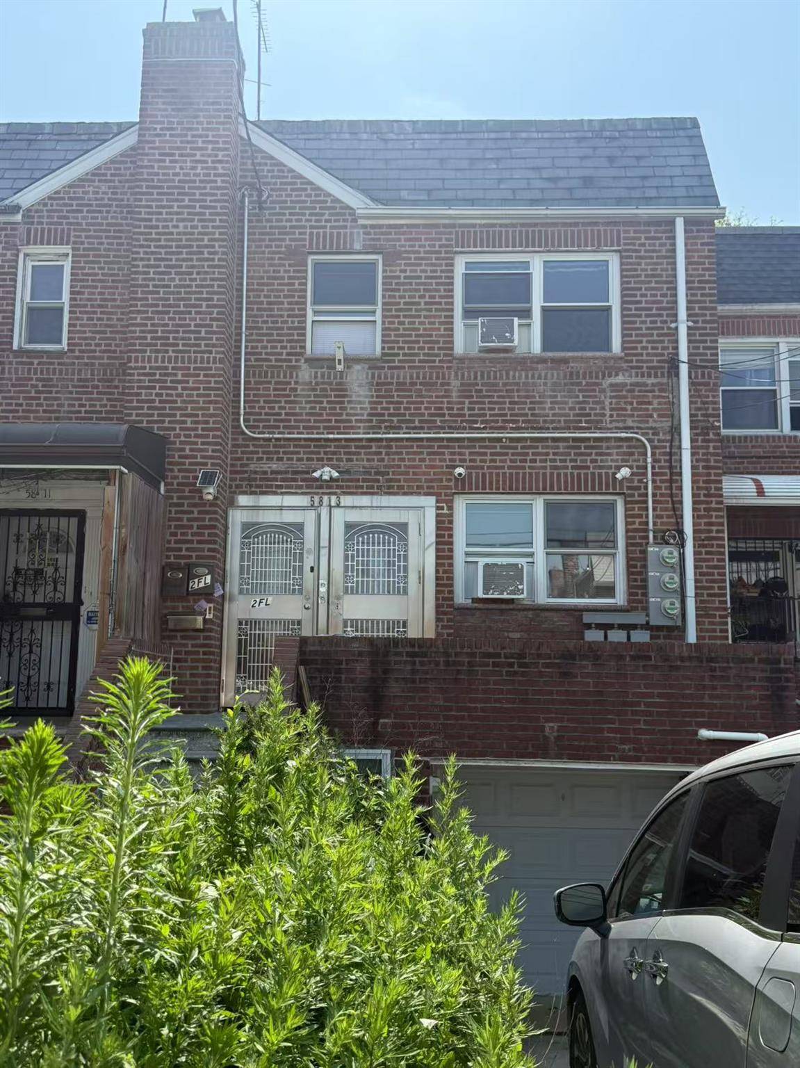 Great opportunity to own a legal two family home in the heart of Flushing !
