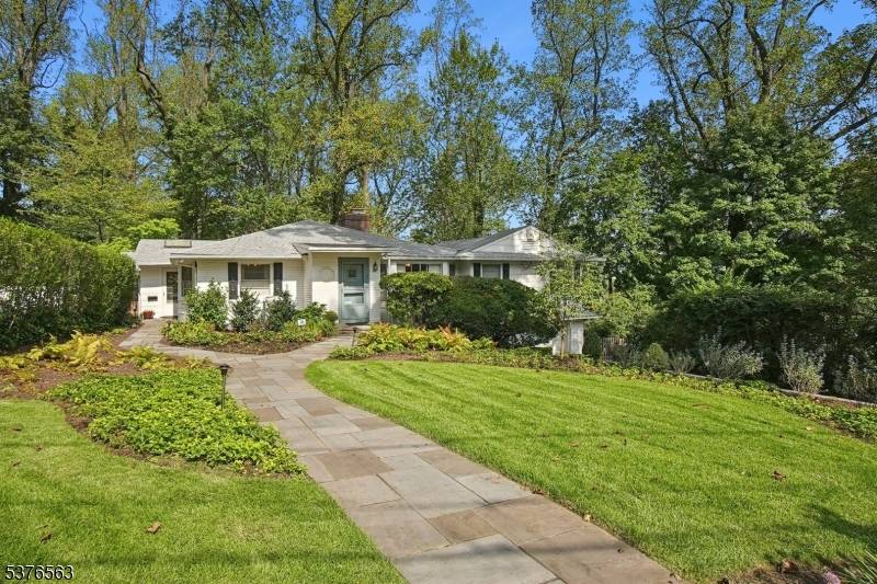 Stunning Custom Mid Century Ranch home located in the prestigious Upper Wyoming neighborhood nestled near the South Mountain Reservation large foyer flanked by a sun filled spacious living room w ...