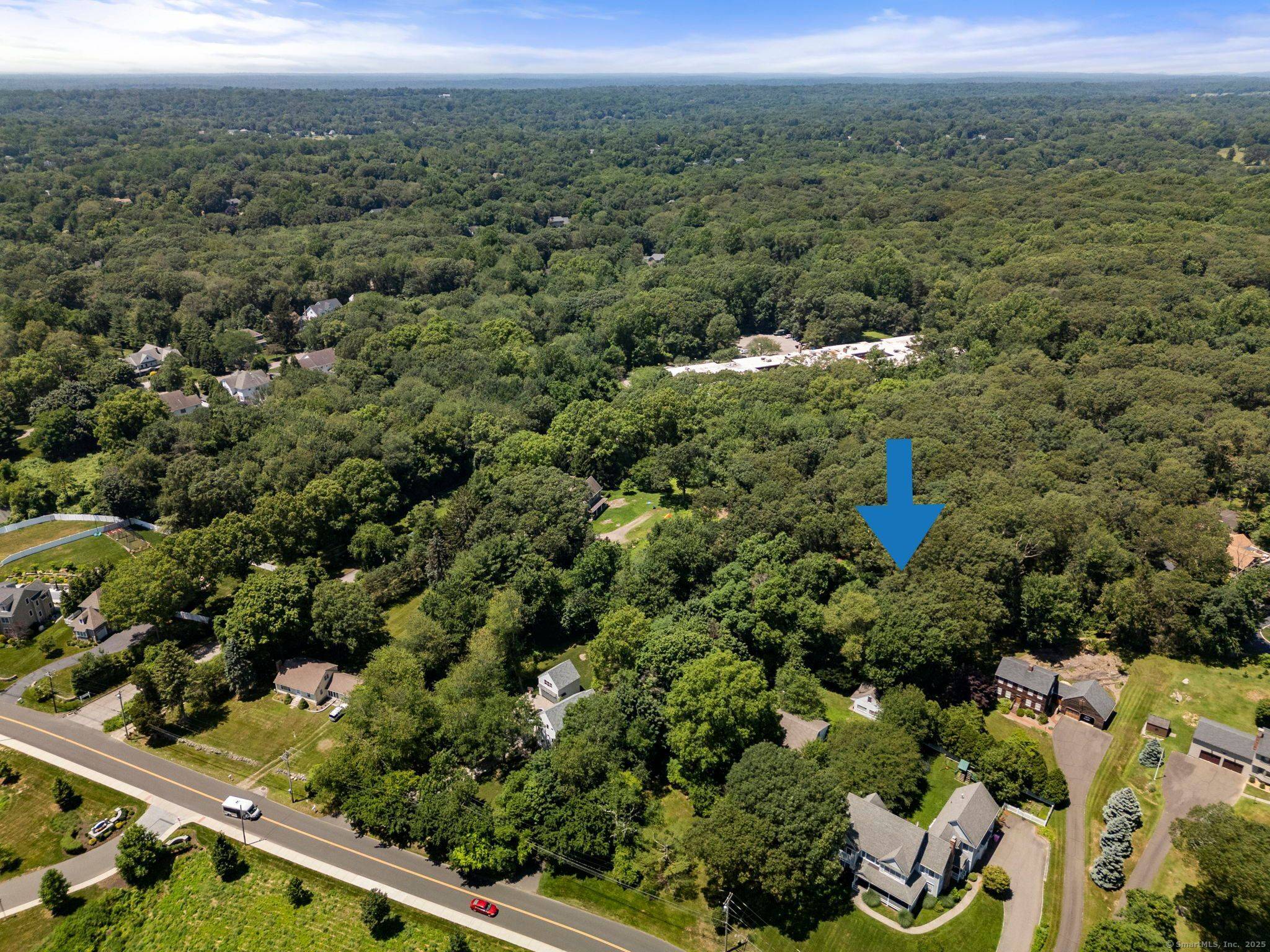 This 1. 02 acre parcel offers the rare combination of privacy and premier location.