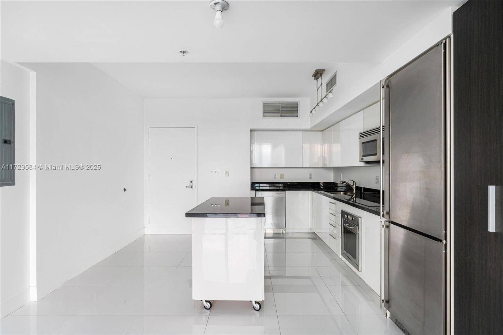 Welcome to the BEST DEAL for an upgraded unit at the MINT Condominium.