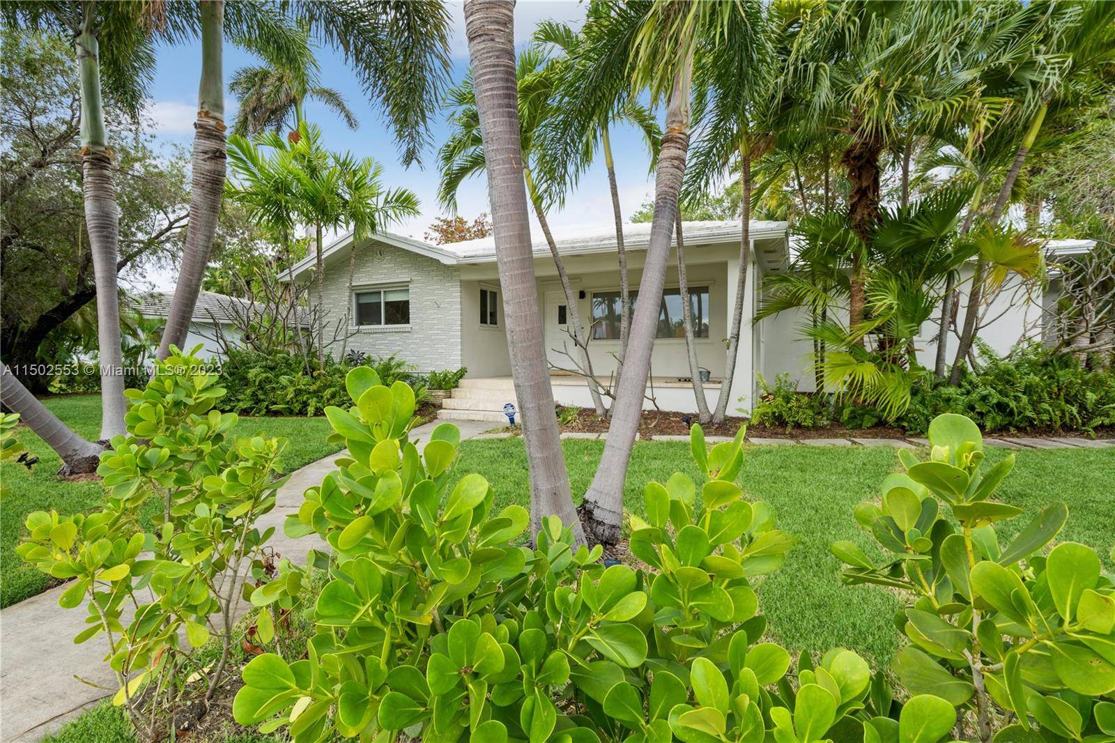 Located in the sought after Hollywood Boulevard, this 15, 759 sf Triple Lot Home is full of natural light.
