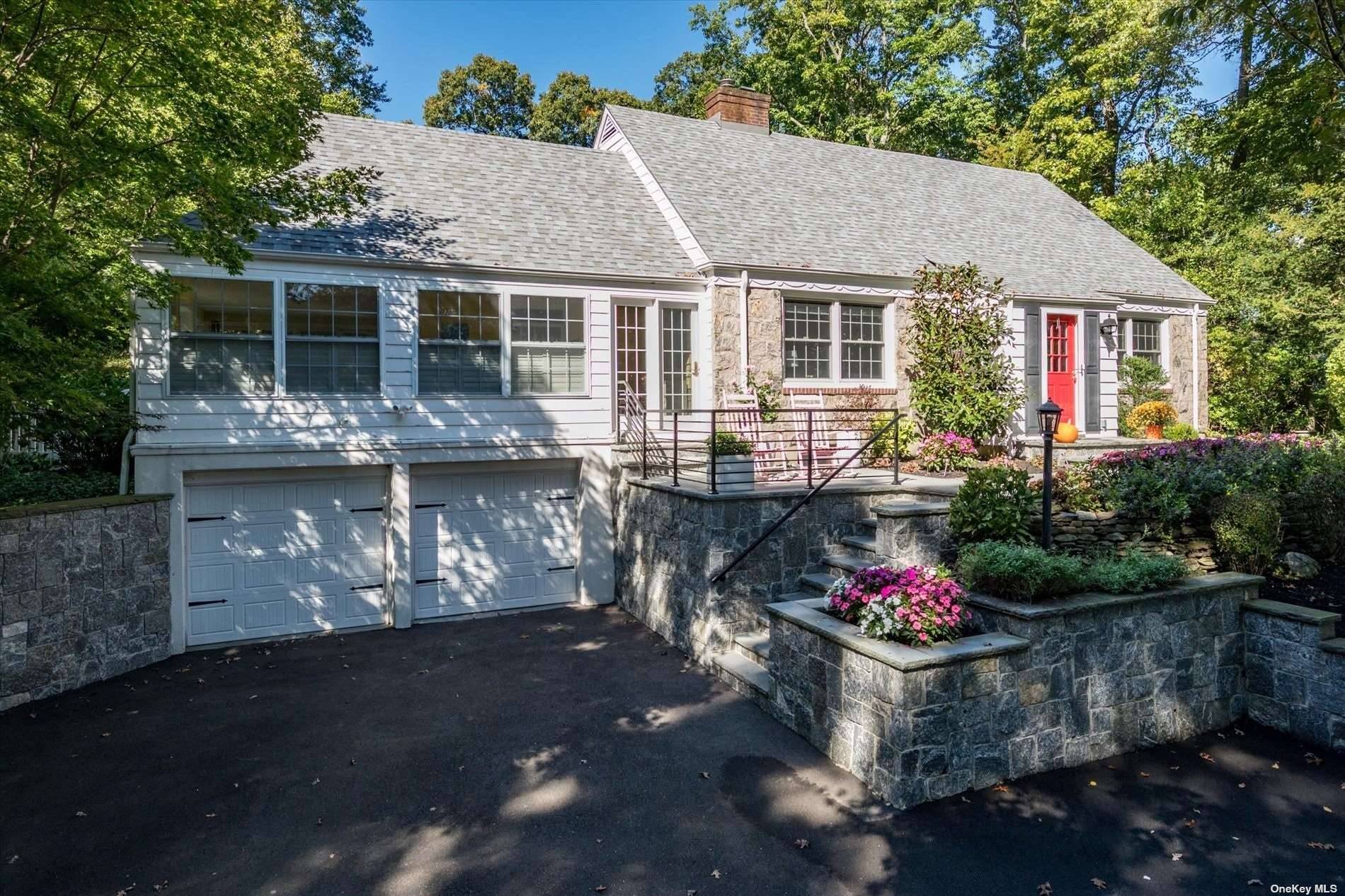 Welcome to 23 Colonial Drive, a captivating residence nestled in the coveted Cold Spring Hills neighborhood of Huntington, just a stone's throw away from the grandeur of Oheka Castle and ...