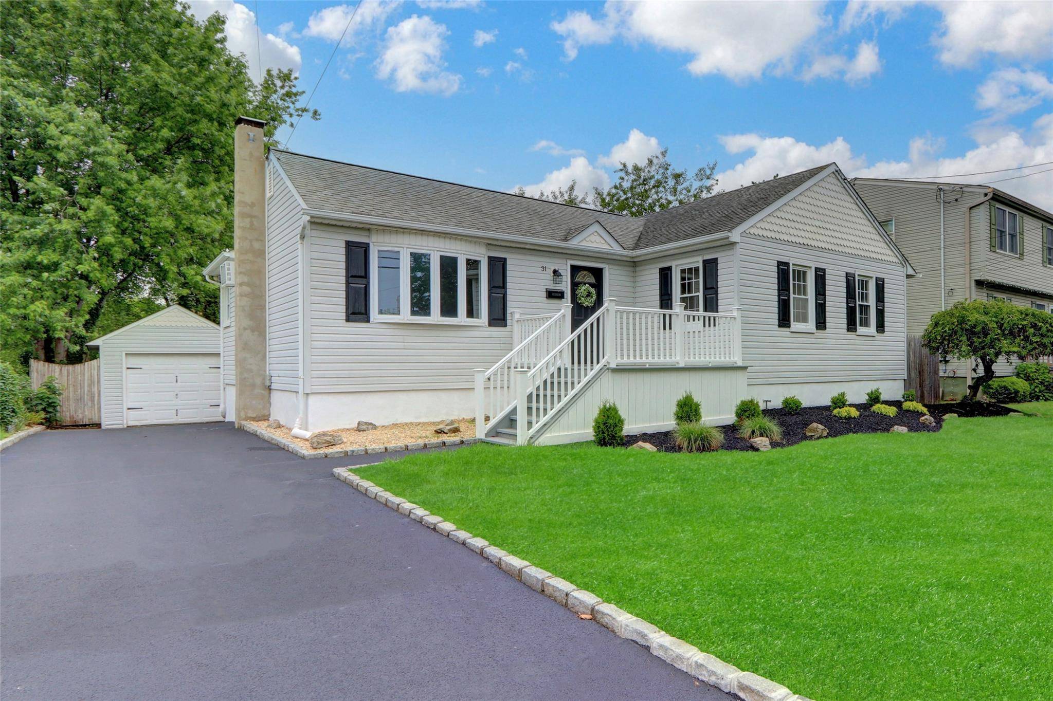 Charming Renovated Home in the Heart of Babylon Village.