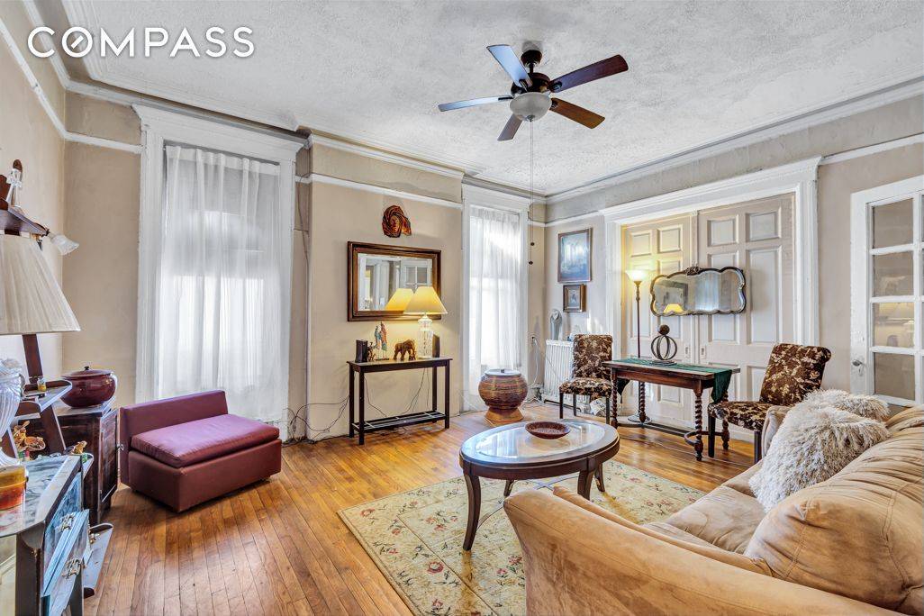 This classic prewar home overlooking Marcus Garvey Park is filled with character, wonderful light, and soaring 10 foot ceilings.