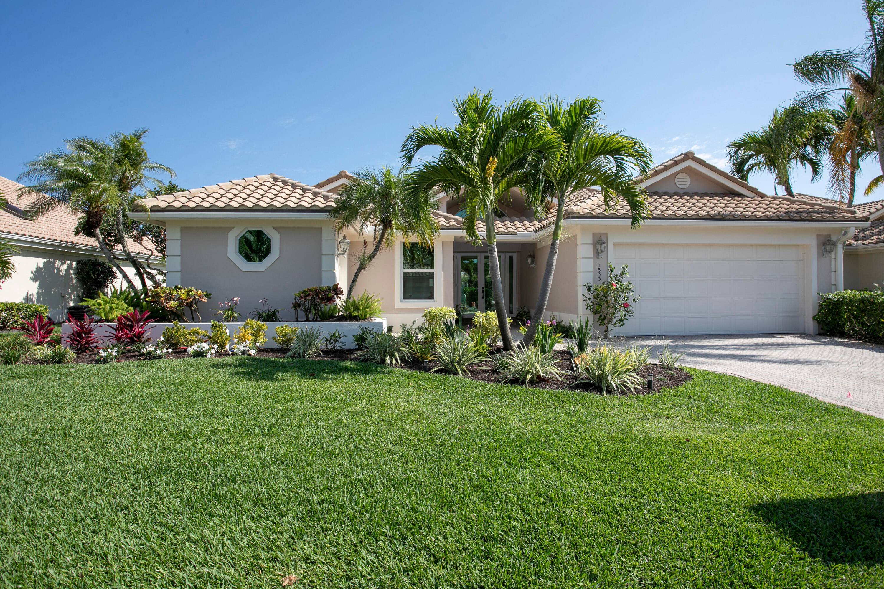 Experience luxury living in this renovated single story home located in the highly sought after Southern Cay community of Jonathan's Landing.