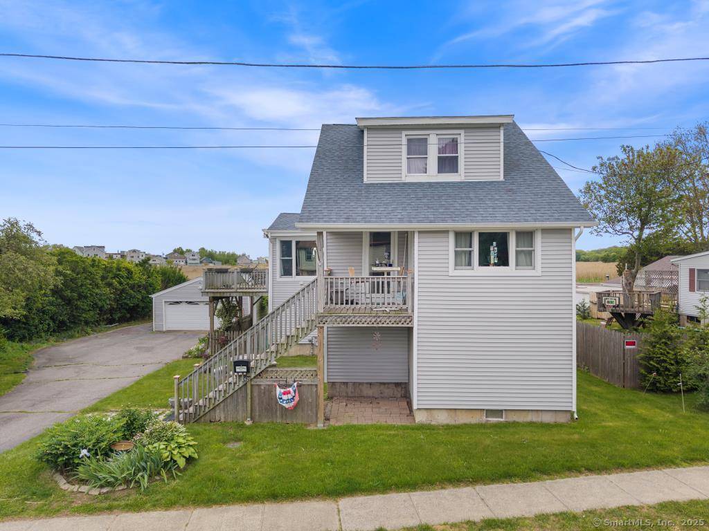 Feel the salt water breezes and enjoy the scenic views of the tidal marsh from the expansive deck included with this 2 3 Bedroom 1.